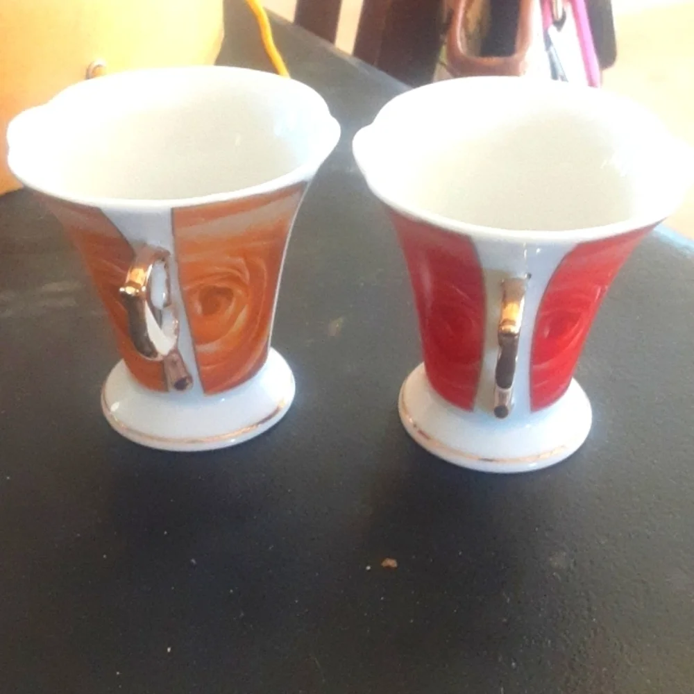 Set of Red and Orange Decorative Cups